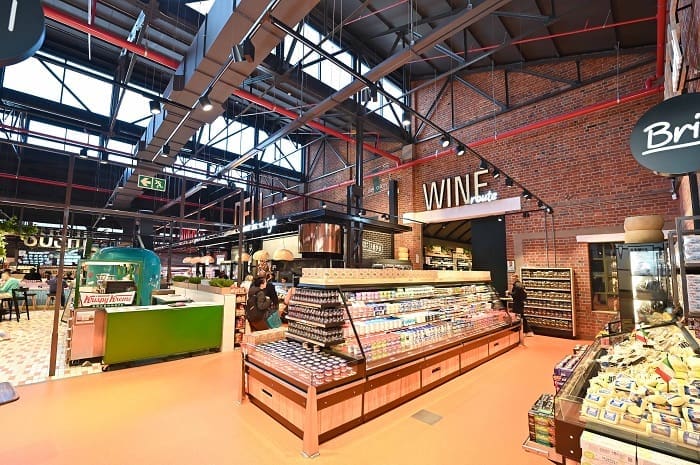 Steel beams_brick wall_from machine shops integrated into store