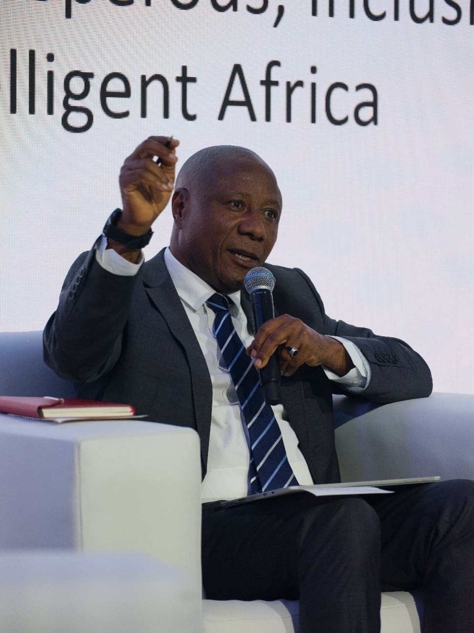Caption: Hon. Kabbyanga Godfrey Baluku speaks at the Ministerial Forum during AfricaCom 2024, focused on building a prosperous, inclusive and sustainable Africa through the development of ICT technologies.
