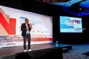 Reginald Sibeko, MD at Micros SA presenting at the Micros Hospitality TechConnect25 Conference