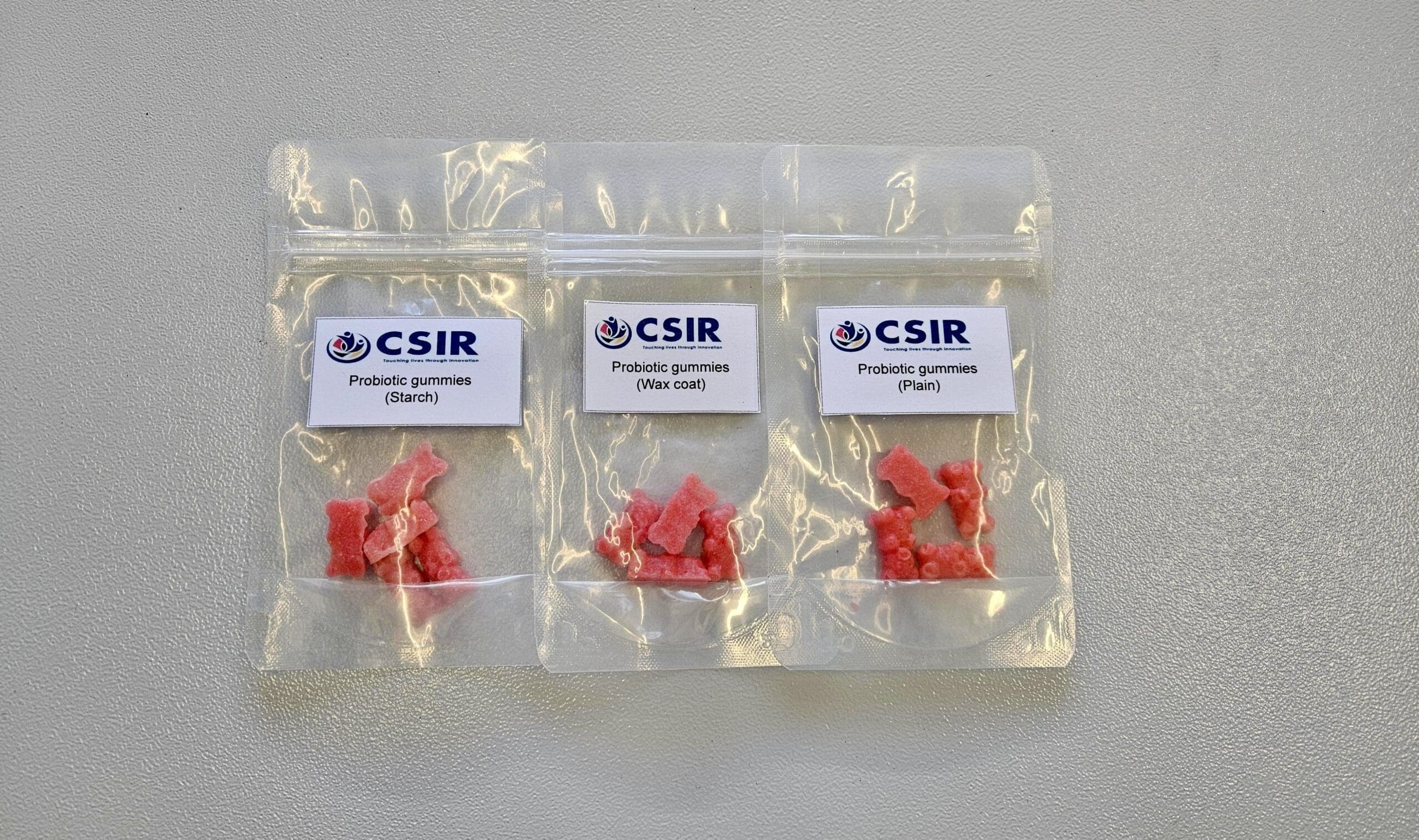 Paediatric gummy prototypes — starch, wax, and plain coated — developed for the delivery of Limosilactobacillus reuteri as a probiotic additive. Formulated by CSIR Bioprocessing to support gut health in children through a safe, effective, and child-friendly supplement.