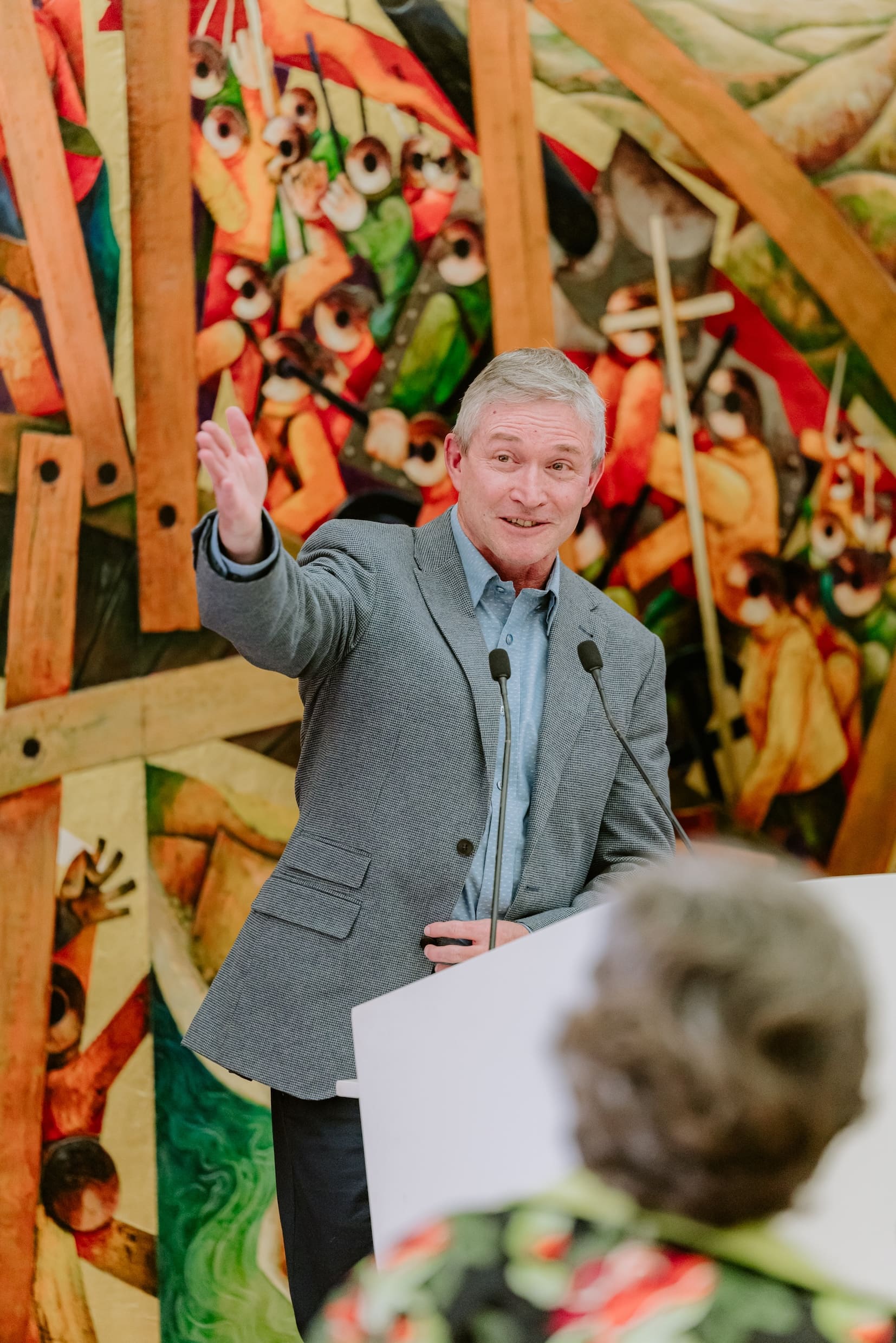Wits University physicist Professor Andrew Forbes gestures during his 2024/2025 Harry Oppenheimer Fellowship Award acceptance speech. The award includes R2.5-million with which to further his research.