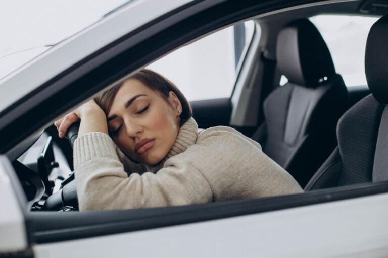 Women sleeping in the car