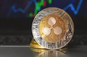 Ripple coin business and finance background with stock chart graphs close up