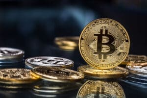 Bitcoin. Golden and silver bitcoins - virtual cryptocurrency.