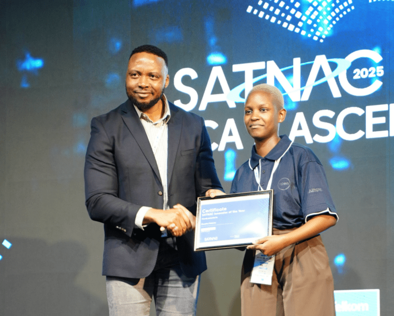 Mr Sello Mmakau (left), Telkom Group Chief Digital Officer, congratulates Olwethu Mabena (right), an Eduvos student, on her SATNAC Innovator of the Year Award.