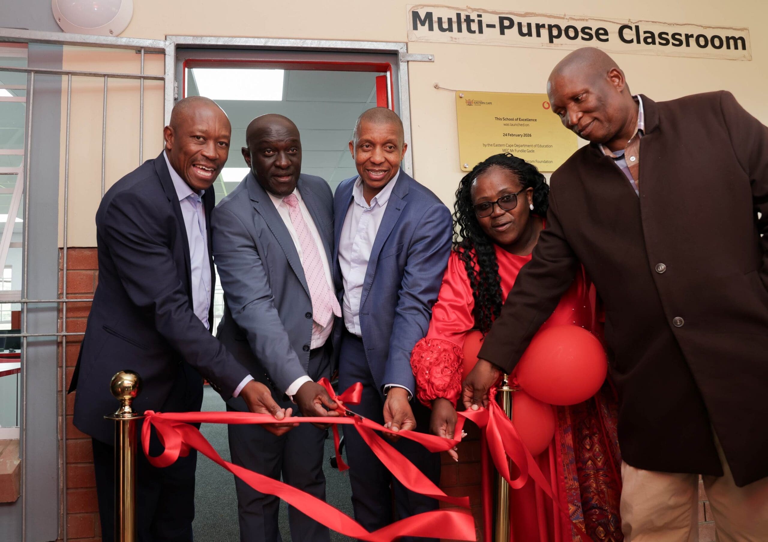 From L-R: Zakhele Jiyane (Managing Executive for Vodacom Eastern Cape), Mr Fundile Gade, Eastern Cape MEC for Education Mpumelelo Khumalo, (Regional Operations Executive for Vodacom South Africa), Principal Sisanda Hexana of Lavelilanga Senior Secondary School.